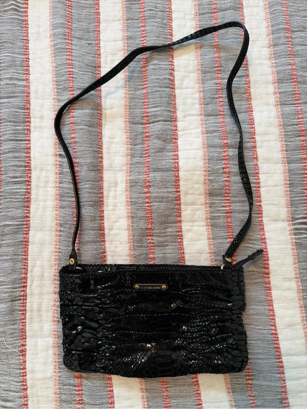 Michael Kors Black Patent Leather Crossbody Bag with Snake-Embossed Texture
